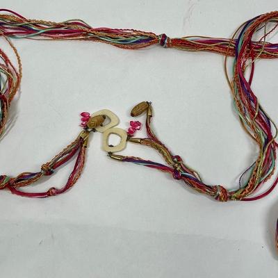 Muti-strand, multi-colored string belt and necklace