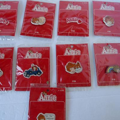Lot of All Different Orphin Annie Plastic Pins
