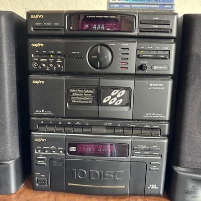 SANYO 10 DISC PLAYER, DUAL CASSETTE, AM/FM STEREO, EQUALIZER & A PAIR OF SPEAKERS W/REMOTE
