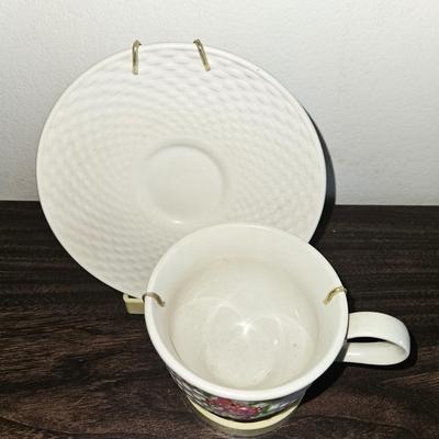 Vintage 1985 Floral Teacup and Cream-Colored Saucer
