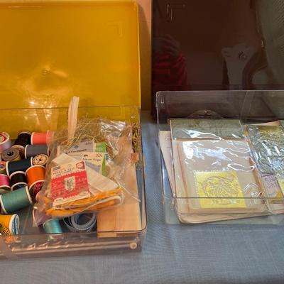 Vintage plastic containers with crafting items