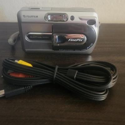 Fuji Film Digital Camera with wires and carrier