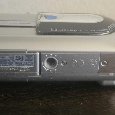 Fuji Film Digital Camera with wires and carrier