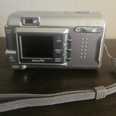 Fuji Film Digital Camera with wires and carrier