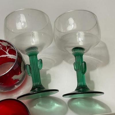 Vintage Glass Lot of 6-Pieces; Art Glass Ladle, Cactus Stemware, Etched Ruby Glass Cup, & 2-Souvenir Blue Glass Shot Glasses as...