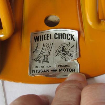 Two Older Nisson Wheel Chock