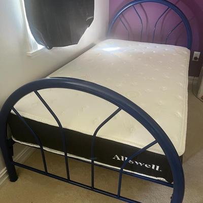 Blue metal twin bed frame with twin mattress
