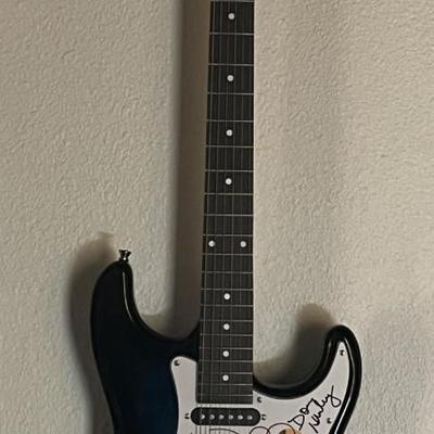 The Eagles band signed stratocaster style guitar