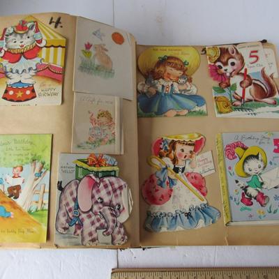 Old Scrap Book With Old Used Greeting Cards