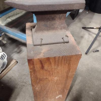 Steel Railroad Rail Anvil on Wood Block