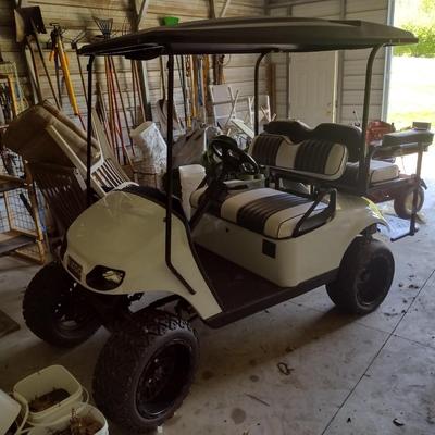 Electric Street Legal EZ-Go Golf Cart with Canopy, LED Headlights, and Rear Seats