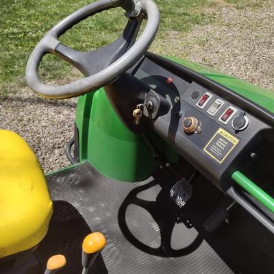 John Deere Gator TX with 1243 Hrs. Dump Bed