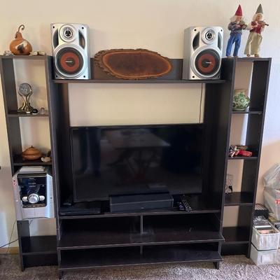 L11- Black entertainment center (contents not included)