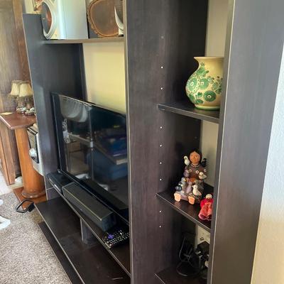 L11- Black entertainment center (contents not included)