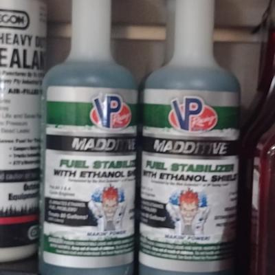 Assortment of Engine Fluids and Fuel Additives New-in-Bottle