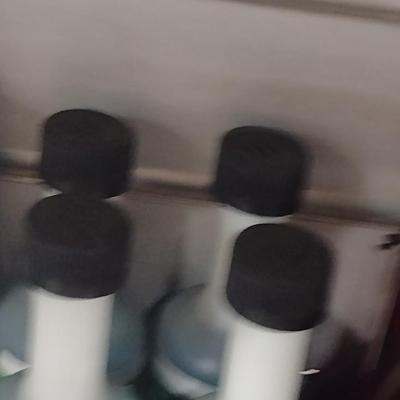 Assortment of Engine Fluids and Fuel Additives New-in-Bottle