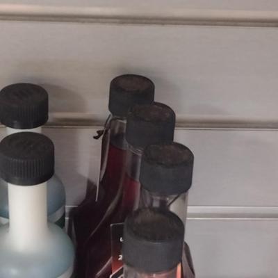 Assortment of Engine Fluids and Fuel Additives New-in-Bottle