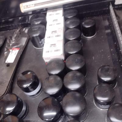 Collection of New Mower Blades and Small Engine Oil Filters Choice D