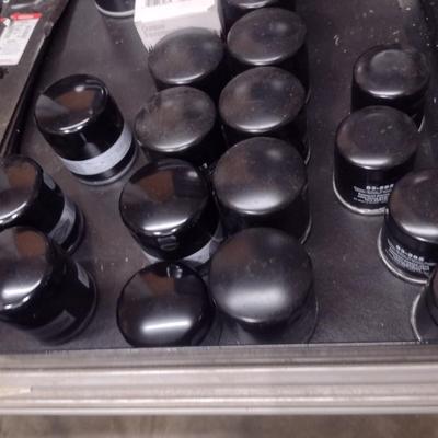 Collection of New Mower Blades and Small Engine Oil Filters Choice D