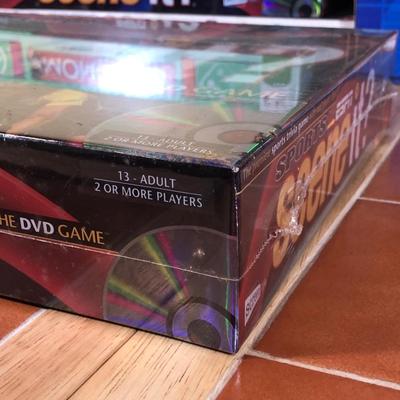 LOT 91B: Large Collection of Board Games incl. NIP Teenage Mutant Ninja Turtles Monopoly & ESPN Sports Scene It? DVD Game