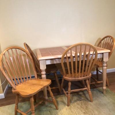 LOT 127B: World Imports Tile Top Dining Table w/ Flip Up Leaf & Four Oak Furniture Chairs