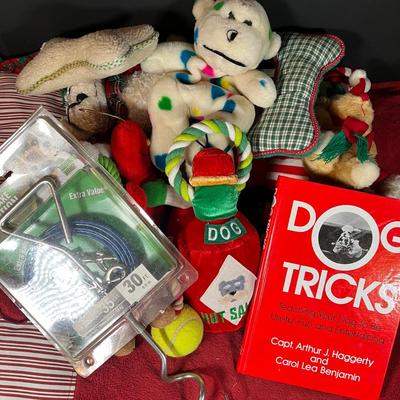 LOT 166G: Pet Supplies - Dog Training Book and Cable Tie-Out with Pet Bed and Toys