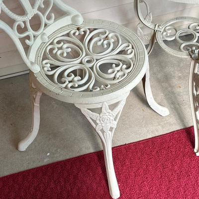 LOT 195 O: Cast Iron Glass-Top Table and Two Chairs