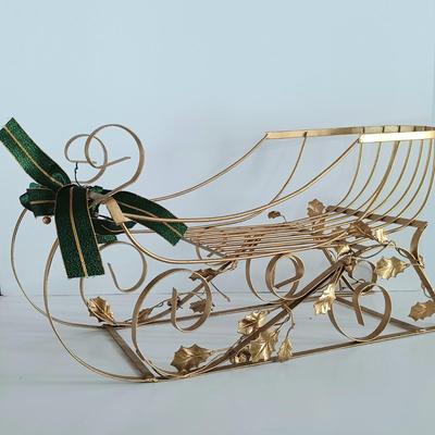LOT 258S: Two Decorative Metal Sleighs with an Assortment of Holiday Decor