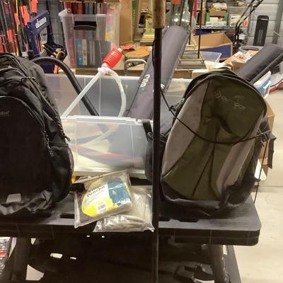 Walking stick, backpacks, kayak pump, with bin