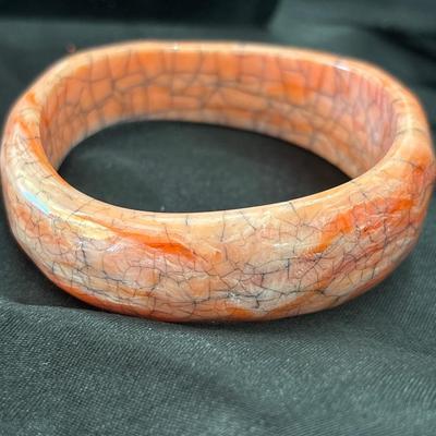Cracked style design coral colored bangle