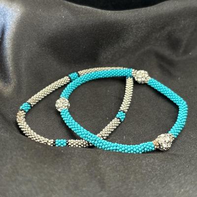 Turquoise tone and silver tone small beaded stretchy bracelets