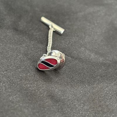 Rare find! Vintage signed Sarah Coventry silver, red, black enamel tie tack with bar. Great condition.