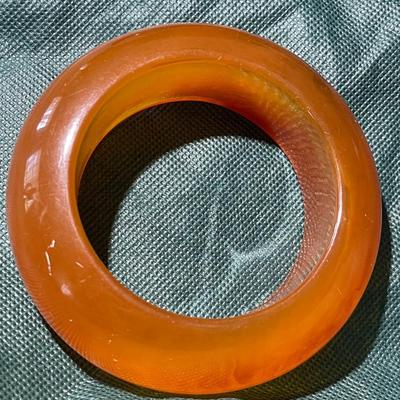 Vintage Translucent Amber Color Heavy 1" Wide Bangle Bracelet in Good Preowned Condition.