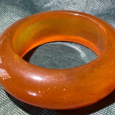 Vintage Translucent Amber Color Heavy 1" Wide Bangle Bracelet in Good Preowned Condition.