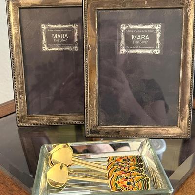 Glass top side table , pair of Sterling frames, Decorative spoons