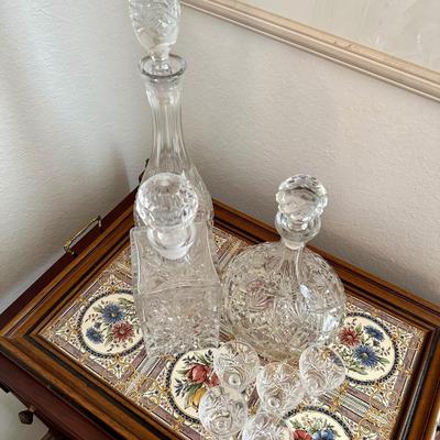 Occasional table with tile tray, decanters, art & brass floor lamp