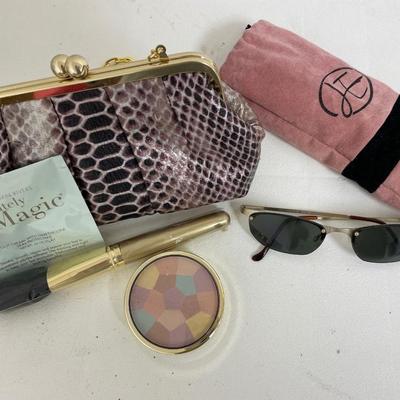 Joan Rivers Small purse with makeup and sunglasses