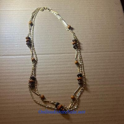 BROWN AND GOLD NECKLACE