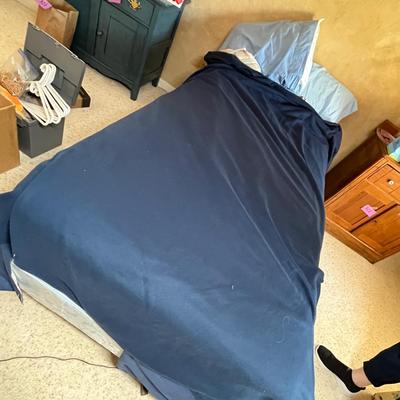 Twin bed with sheets