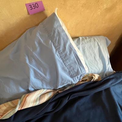 Twin bed with sheets