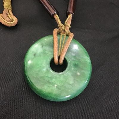 Vintage green, jade donut pendant on leather necklace