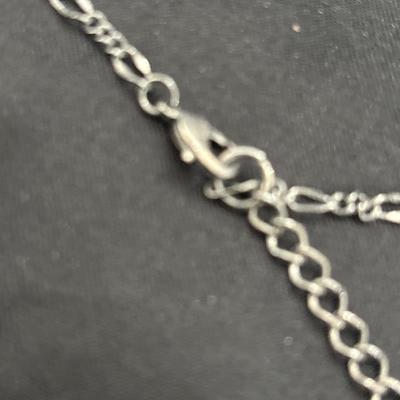 Extra long silver toned with big ball pendant