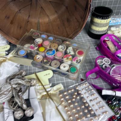 Sewing Items; Thread, Lace, Appliques  with a sm. Basket