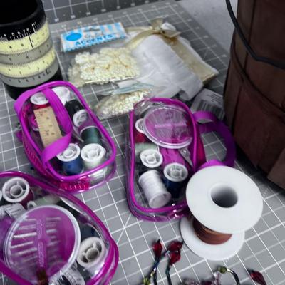 Sewing Items; Thread, Lace, Appliques  with a sm. Basket