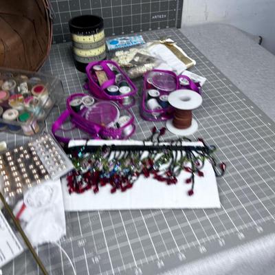 Sewing Items; Thread, Lace, Appliques  with a sm. Basket