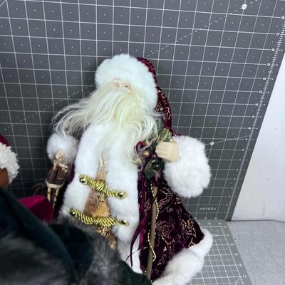 3 Santa Figures and a Porcelain Doll