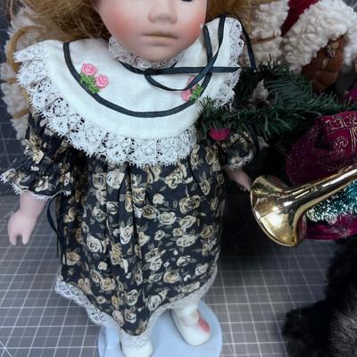 3 Santa Figures and a Porcelain Doll