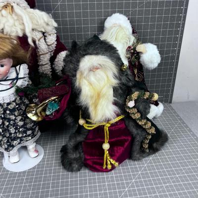 3 Santa Figures and a Porcelain Doll