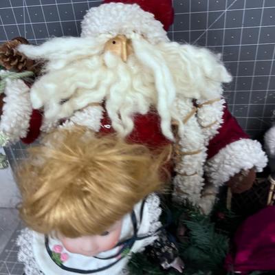 3 Santa Figures and a Porcelain Doll