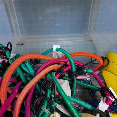 Tub with Bungie Cords and Straps